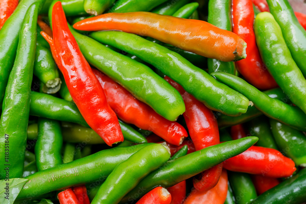 Red and green Fresh chilli peppers with top view