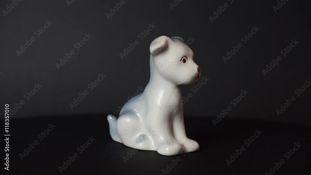 Shooting of a figurine of a dog. Shooting of a figurine of a dog.