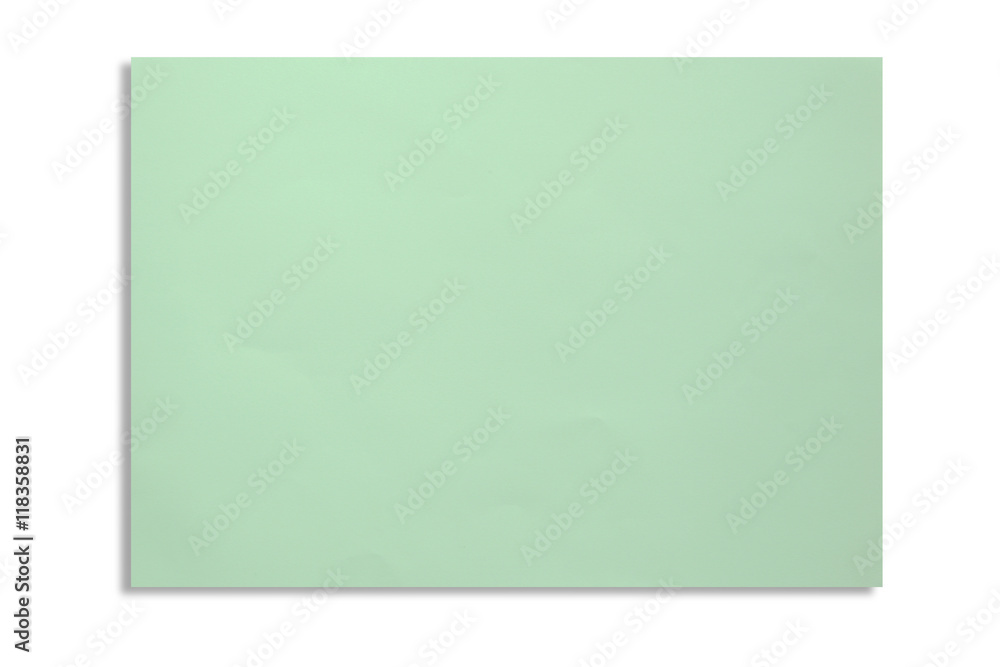 Closeup the green color A4 paper with shadow isolated on white background. Closeup the green color A4 paper with shadow isolated on white background.