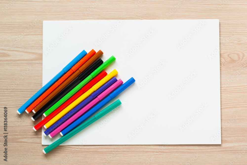 Fototapeta premium Pencils, crayons and album sheet