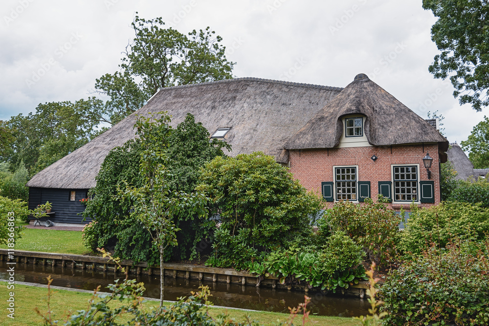 The house stands between the channels in the Dutch village of Gi The house stands between the channels in the Dutch village of Gi