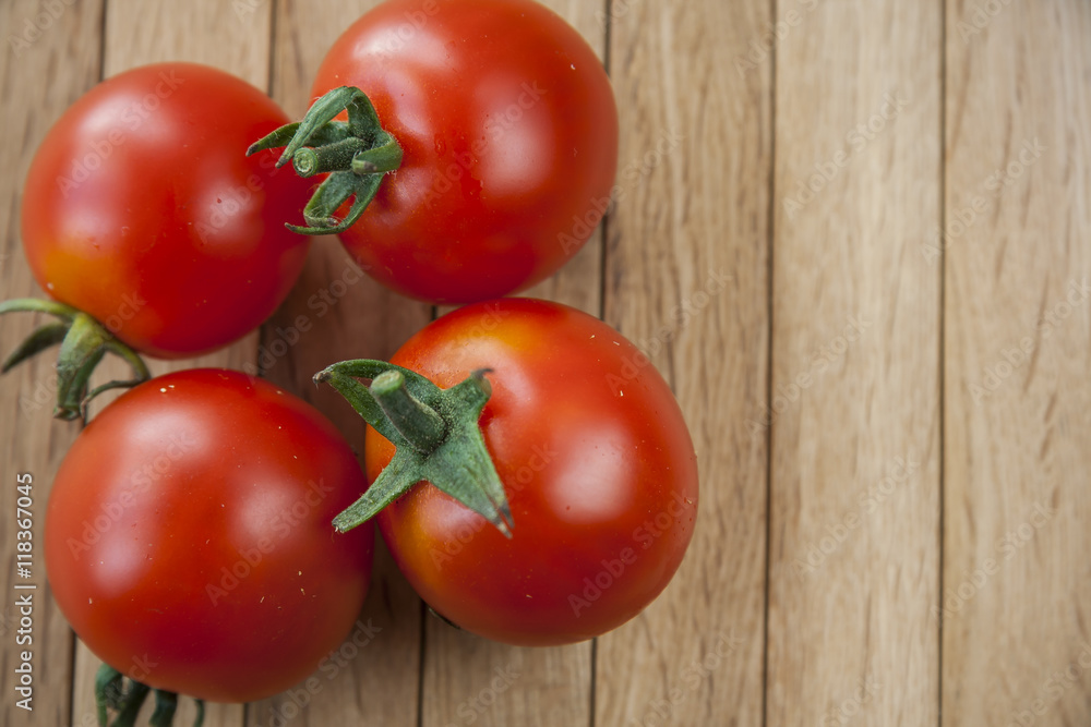 Plum Tomatoes On The Wooden Table Plum Tomatoes On The Wooden Table