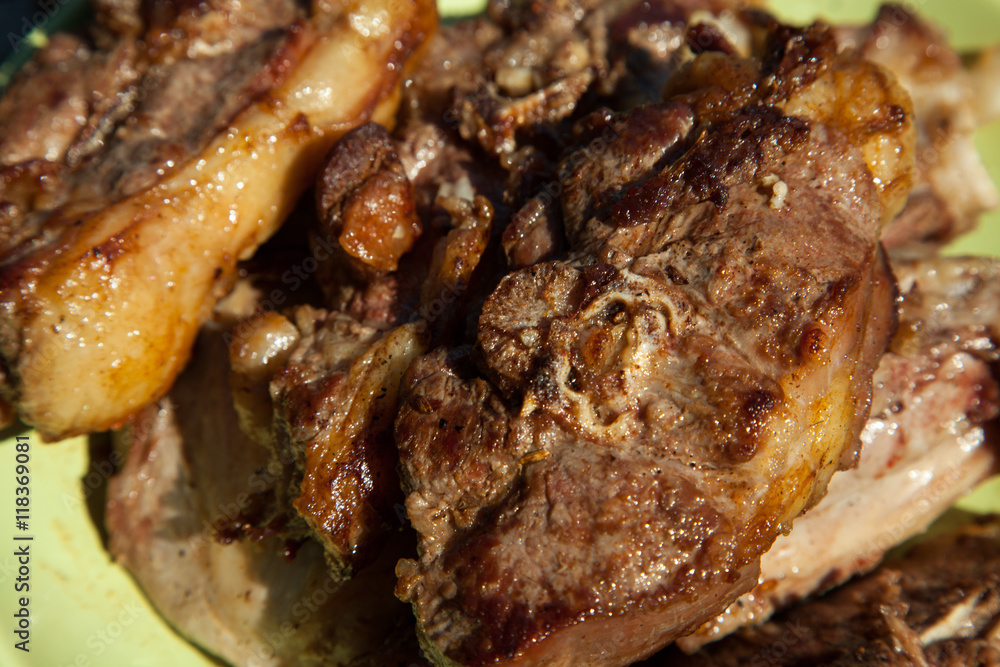 Roast leg of lamb. Shallow DoF, focus in centre of image on herb. Roast leg of lamb. Shallow DoF, focus in centre of image on herb.