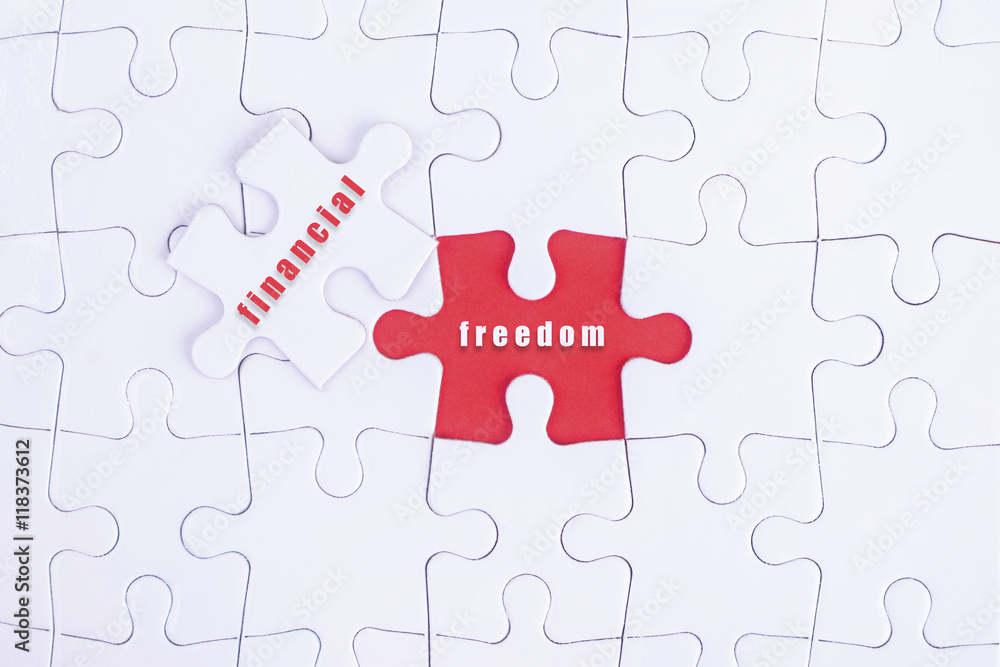 Fototapeta premium Missing white puzzle with financial, freedom word and copyspace