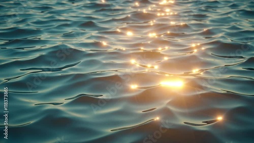 Sunlight sparkles over ocean waves  photo