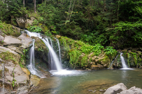 Mountain river with waterfall and rocks at national park in the Skole Beskids near Lviv