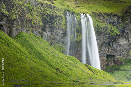 waterfall between two hills in Iceland