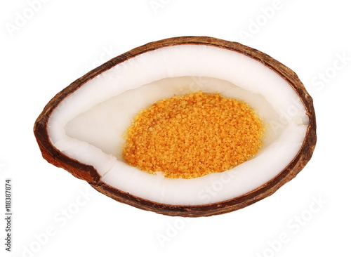 Coconut half and coconut sugar isolated on white