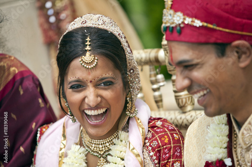Indian bride and groom in traditional clothing photo