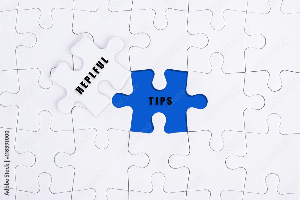 Fototapeta premium Helpful Tips concept on puzzle.