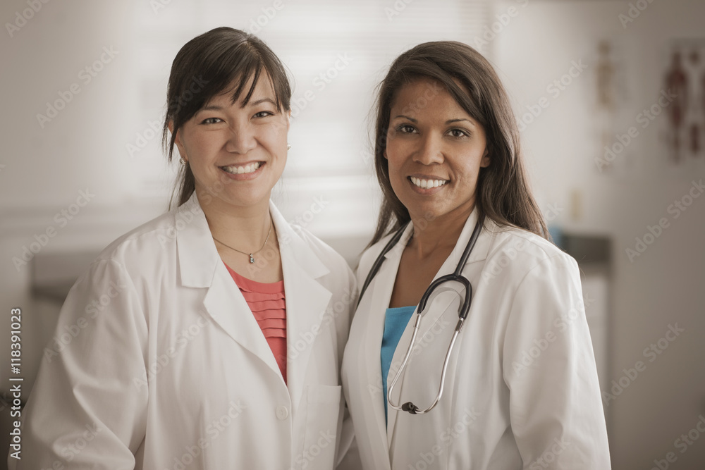 Smiling doctor standing together Smiling doctor standing together