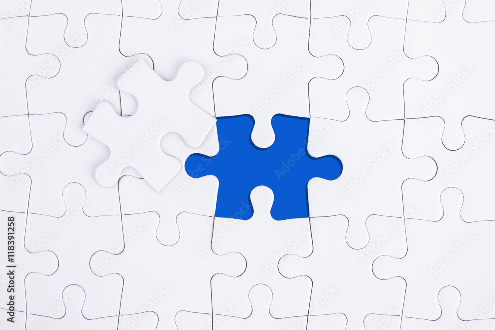 WHITE AND BLUE MISSING PUZZLE WITH COPY SPACE AREA. WHITE AND BLUE MISSING PUZZLE WITH COPY SPACE AREA.