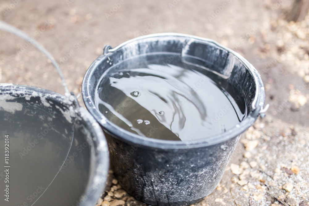droplets in water in a bucket droplets in water in a bucket
