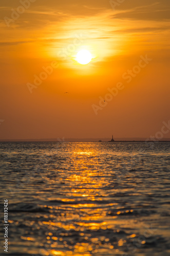 sunset over the sea © ncikname