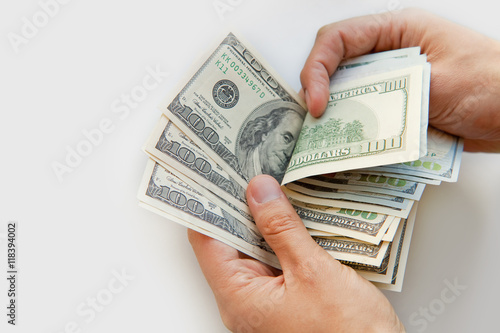 Close up of male hands with money