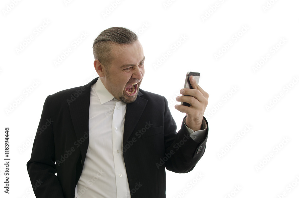 furious businessman in a jacket screaming in mobile phone handse furious businessman in a jacket screaming in mobile phone handse