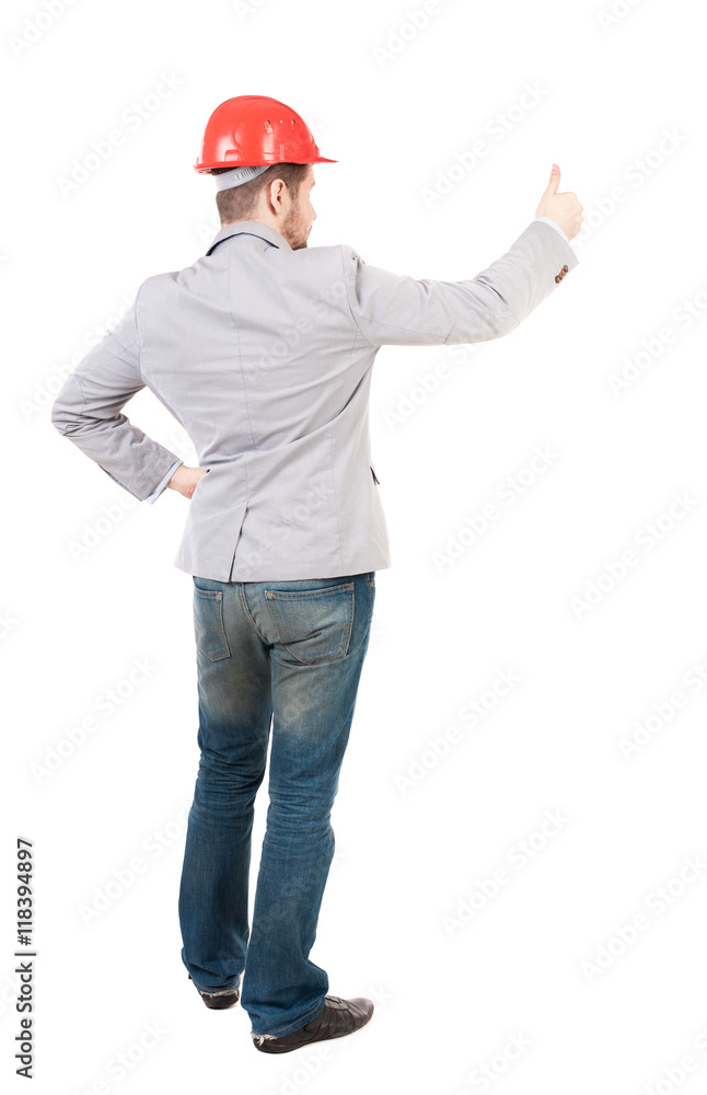 Back view of business man shows thumbs up. Rear view people collection. cheerful office worker shows positive emotions. backside view of person. Isolated over white background. A guy in a gray Back view of business man shows thumbs up. Rear view people collection. cheerful office worker shows positive emotions. backside view of person. Isolated over white background. A guy in a gray
