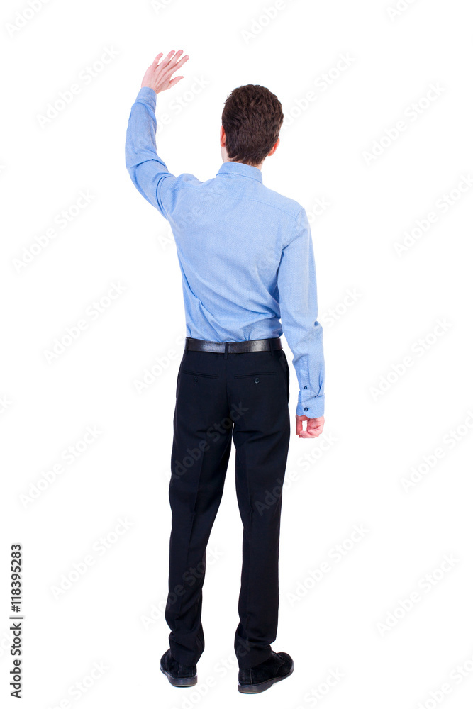 Back view of beautiful business man welcomes. Young businessman in suit. Rear view people collection. backside view of person. Isolated over white background. Businessman in blue shirt, waving. Back view of beautiful business man welcomes. Young businessman in suit. Rear view people collection. backside view of person. Isolated over white background. Businessman in blue shirt, waving.