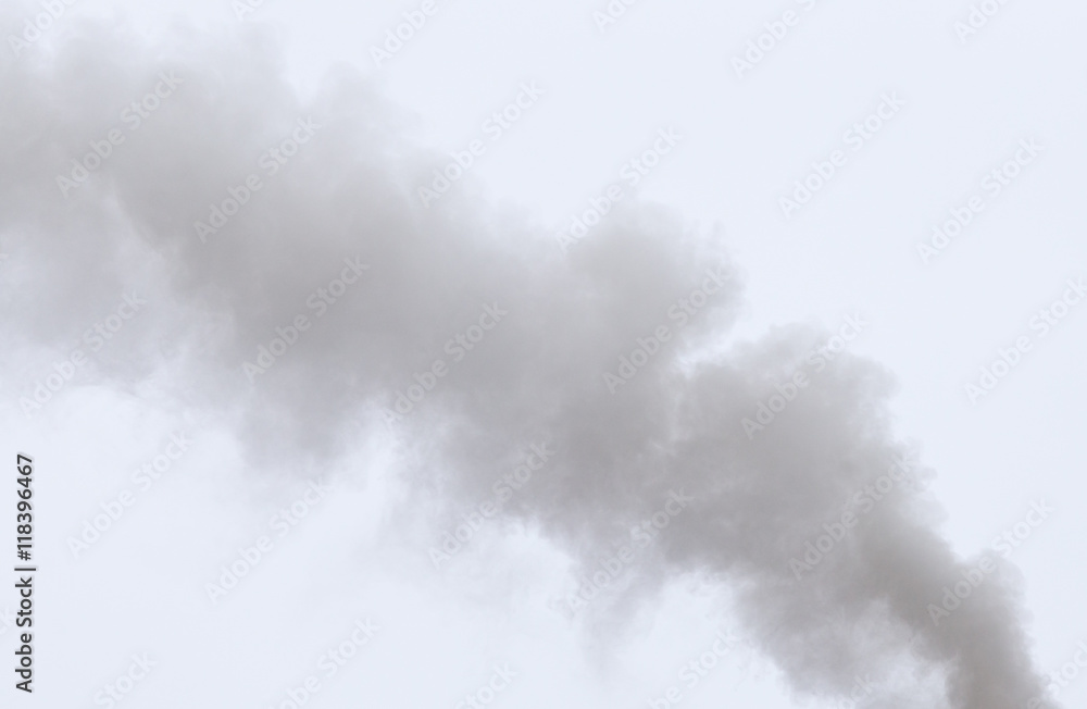 Smoke from a pipe on a cloudy sky Smoke from a pipe on a cloudy sky
