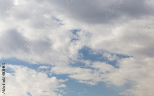 Beautiful clouds on a blue sky as background © schankz