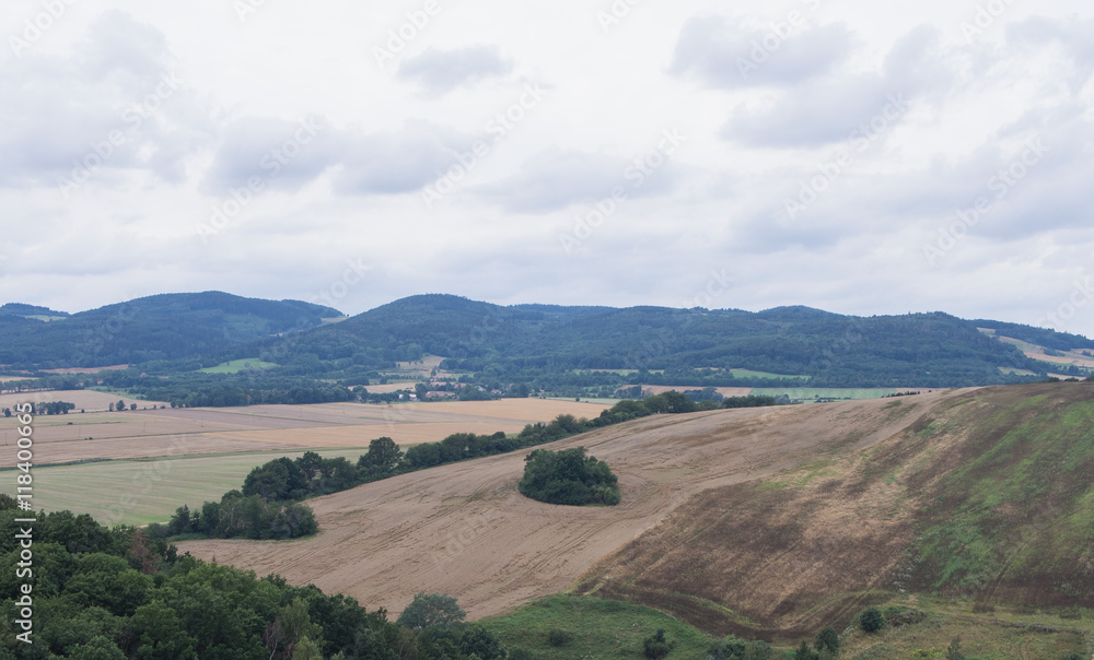 Beautiful hilly landscape with field and trees in Silesia, Poland