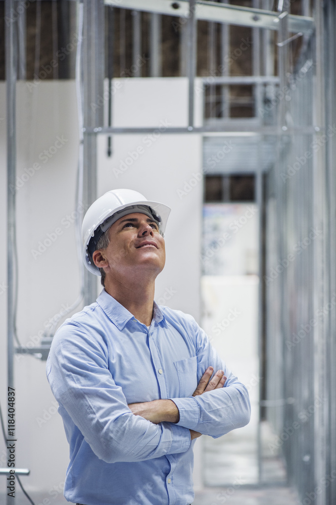 Caucasian architect admiring construction site Caucasian architect admiring construction site