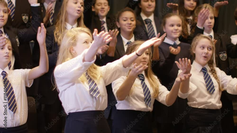 Young students singing in rehearsal for school musical production. Young students singing in rehearsal for school musical production.