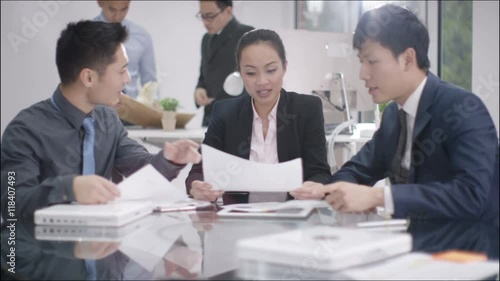 Wallpaper Mural  Corporate business group in a meeting with businessmen shaking hands in foreg Torontodigital.ca
