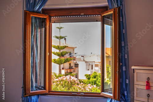 window in a pink wall