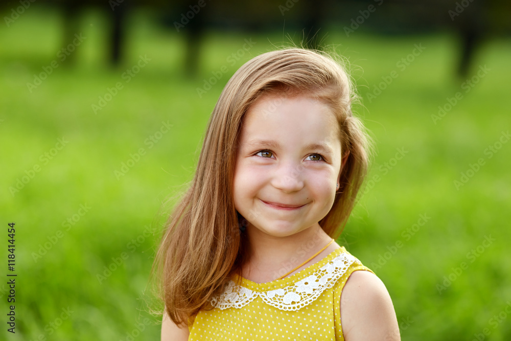 Beautiful smiling little girl with natural long blond hair Beautiful smiling little girl with natural long blond hair