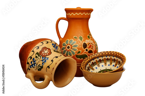 Traditional colored pottery. Painted ceramic crockery. photo