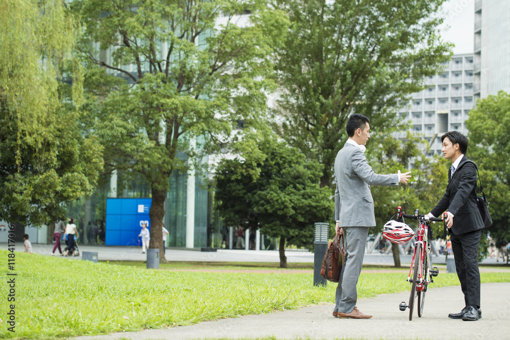 Fototapeta premium Businessman with a bicycle has asked the road