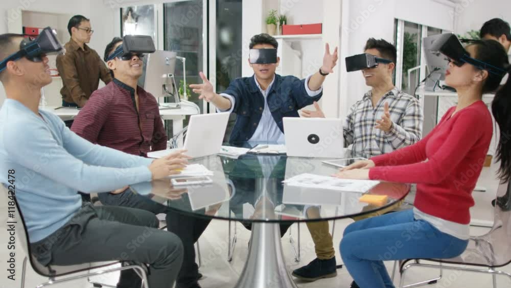 Computer programmers trying out virtual reality viewers Computer programmers trying out virtual reality viewers