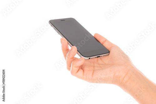 Business hand with mobile phone .