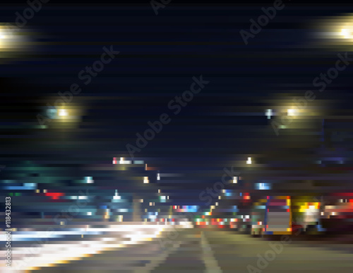 Illuminated city center. Urban streetlights at night. Traffic in motion. Gradient illustration with effect of sliced photo. Background for a poster, cover, business card, invitation, banner, postcard.