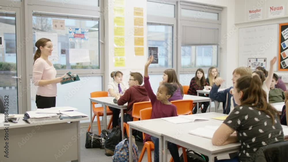 4K Teacher teaching pupils in school class 4K Teacher teaching pupils in school class