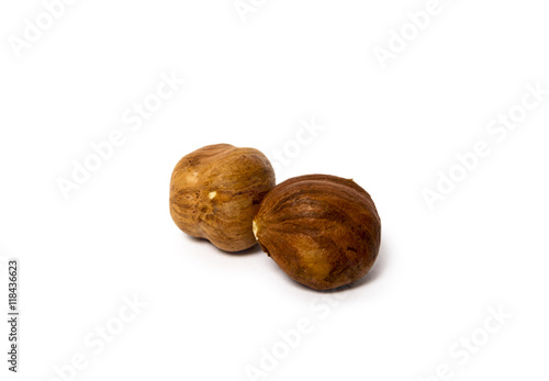 Closeup view of hazelnuts isolated on white background