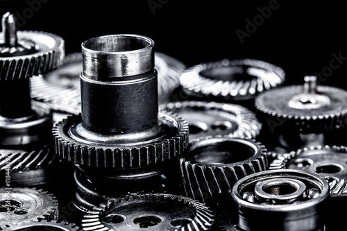 Metal gears on black background