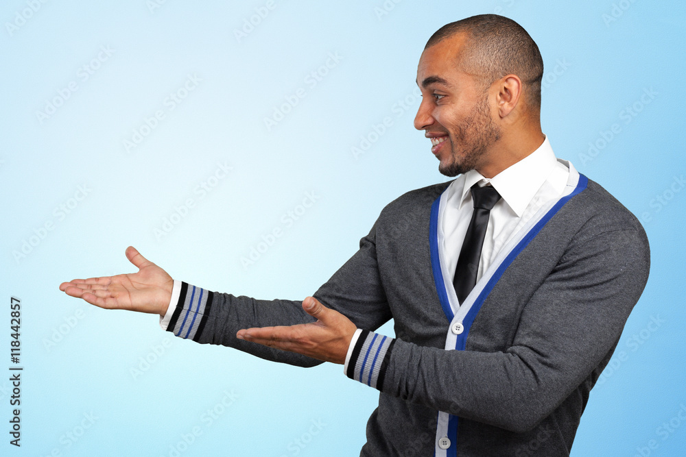 Happy successful businessman pointing on copy space Happy successful businessman pointing on copy space