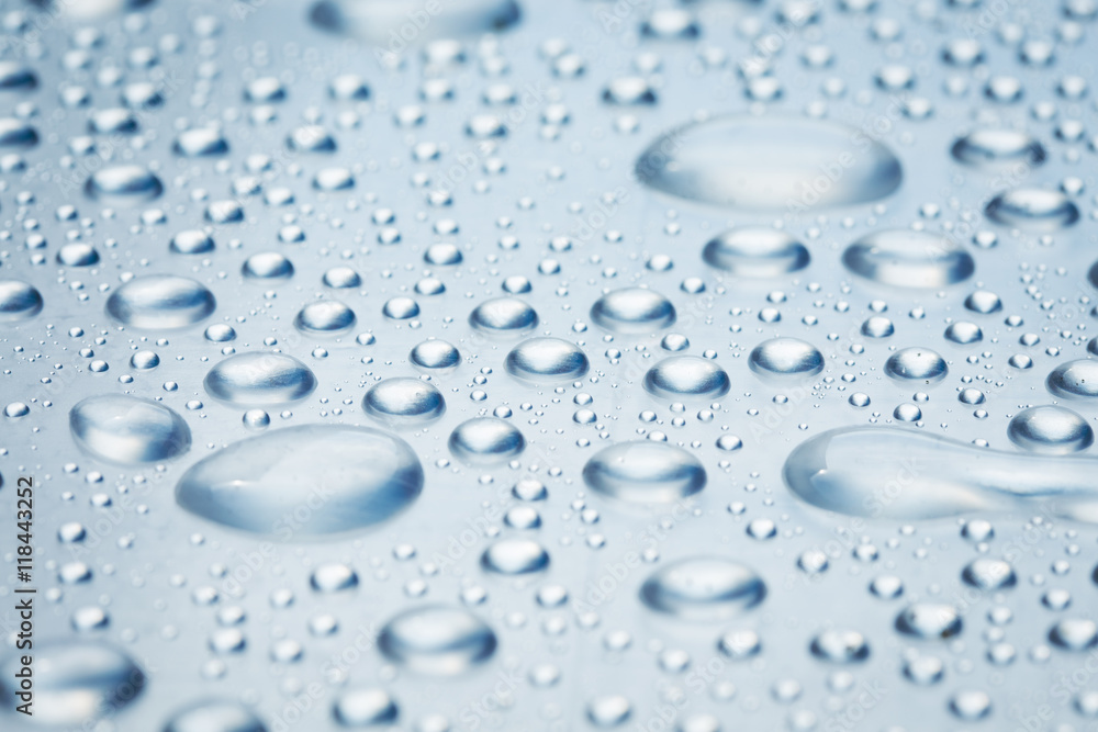 drops of water on a light surface