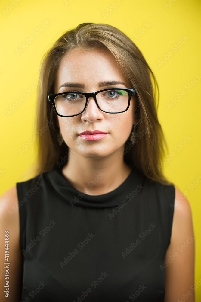 Fototapeta premium Cute young business woman with spectacles
