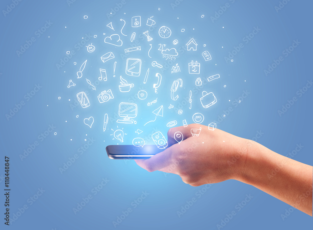 Hand with phone and drawn office icons Hand with phone and drawn office icons