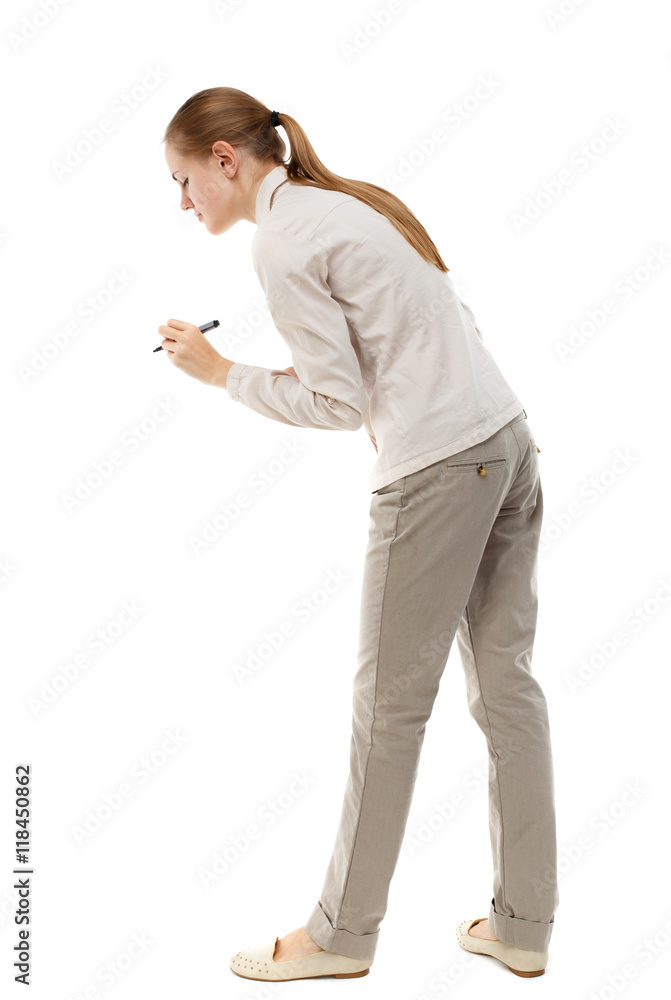 back view of writing beautiful woman. Rear view people collection. backside view of person. Isolated over white background. Skinny girl in white denim suit writing pens. back view of writing beautiful woman. Rear view people collection. backside view of person. Isolated over white background. Skinny girl in white denim suit writing pens.