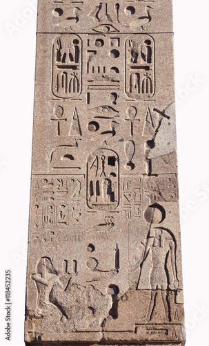 Hieroglyph script on ancient egyptian obelisk in the center of Piazza del Popolo square, Rome