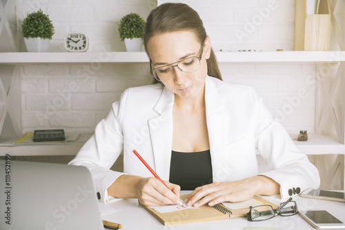 European businesswoman doing paperwork