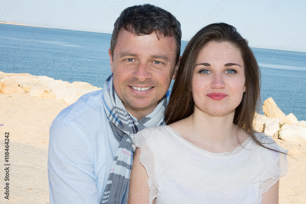 Lovely newly couple at the beach smiling Lovely newly couple at the beach smiling