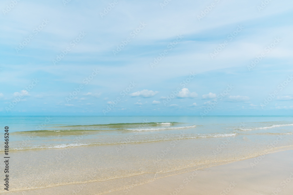 Exotic beach with gentle wave and clear on beach with blue sky