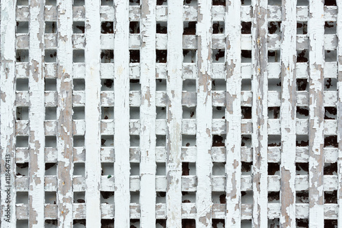 Worn out wooden lattice fence background