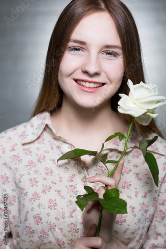 Girl with a white rose photo