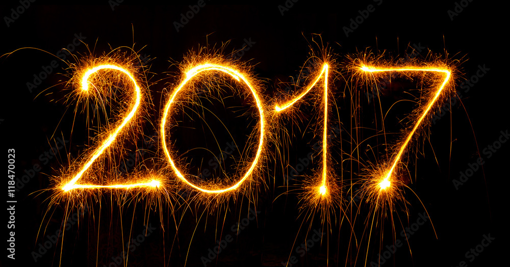 Happy New Year - 2017 with sparklers on black Happy New Year - 2017 with sparklers on black